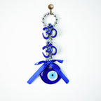 Traditional OM and evil eye wall charm for home spiritual protection