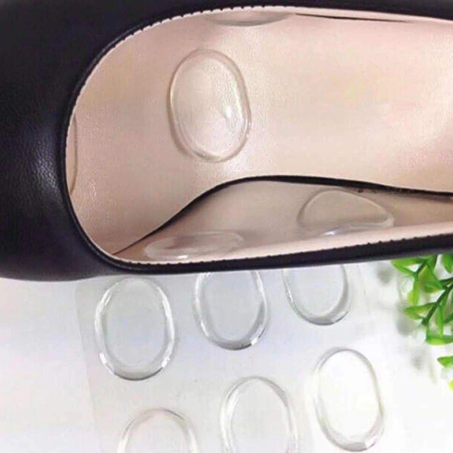 Textured surface of silicone heel pad designed to reduce foot pain