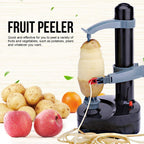 Close-up of electric peeling arm and stainless steel blade in action