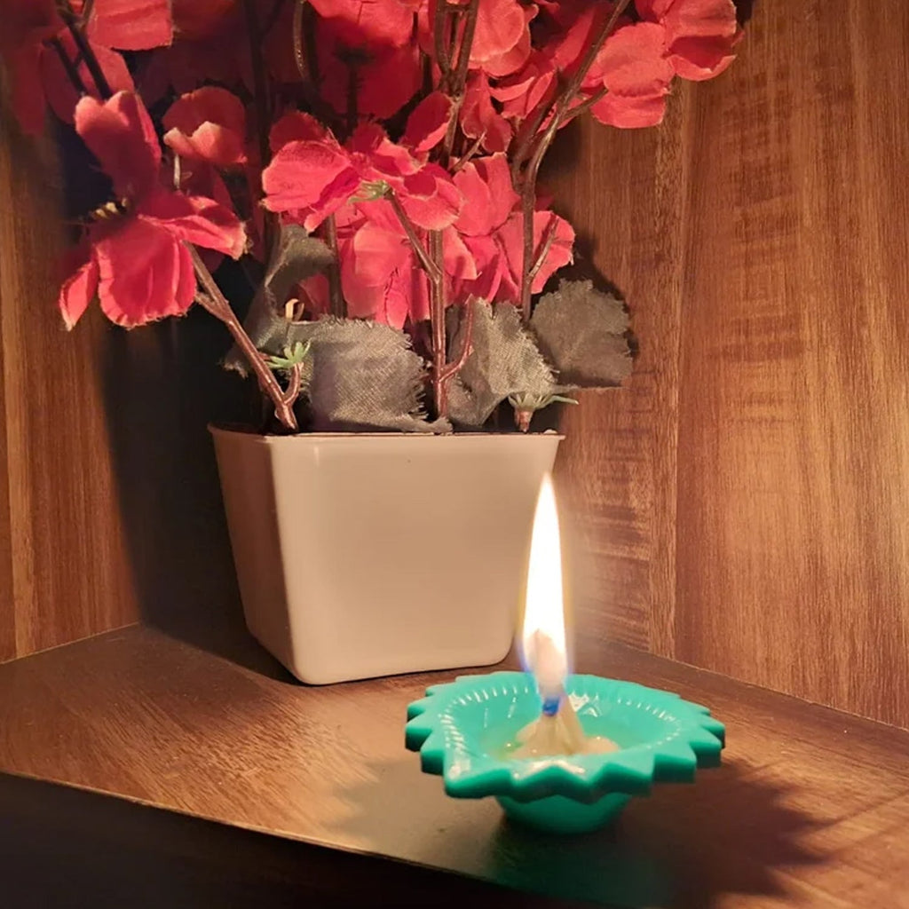 Empty silicone diya cups in various colours, ready for oil or tea lights.