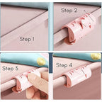 Close-up view of snap grip on quilt corner using elastic bed sheet clip