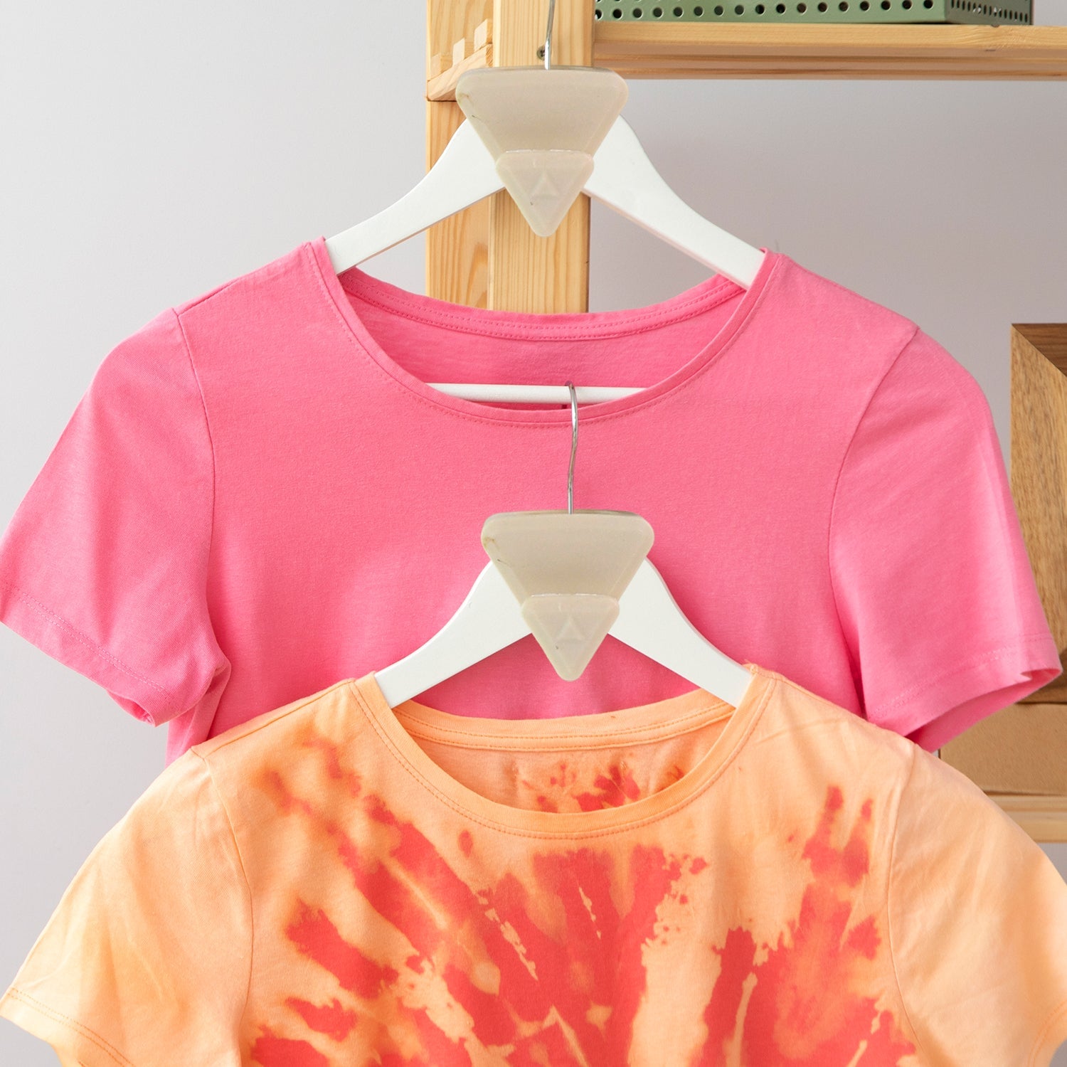Efficient wardrobe storage with plastic triangle hanger connector hooks