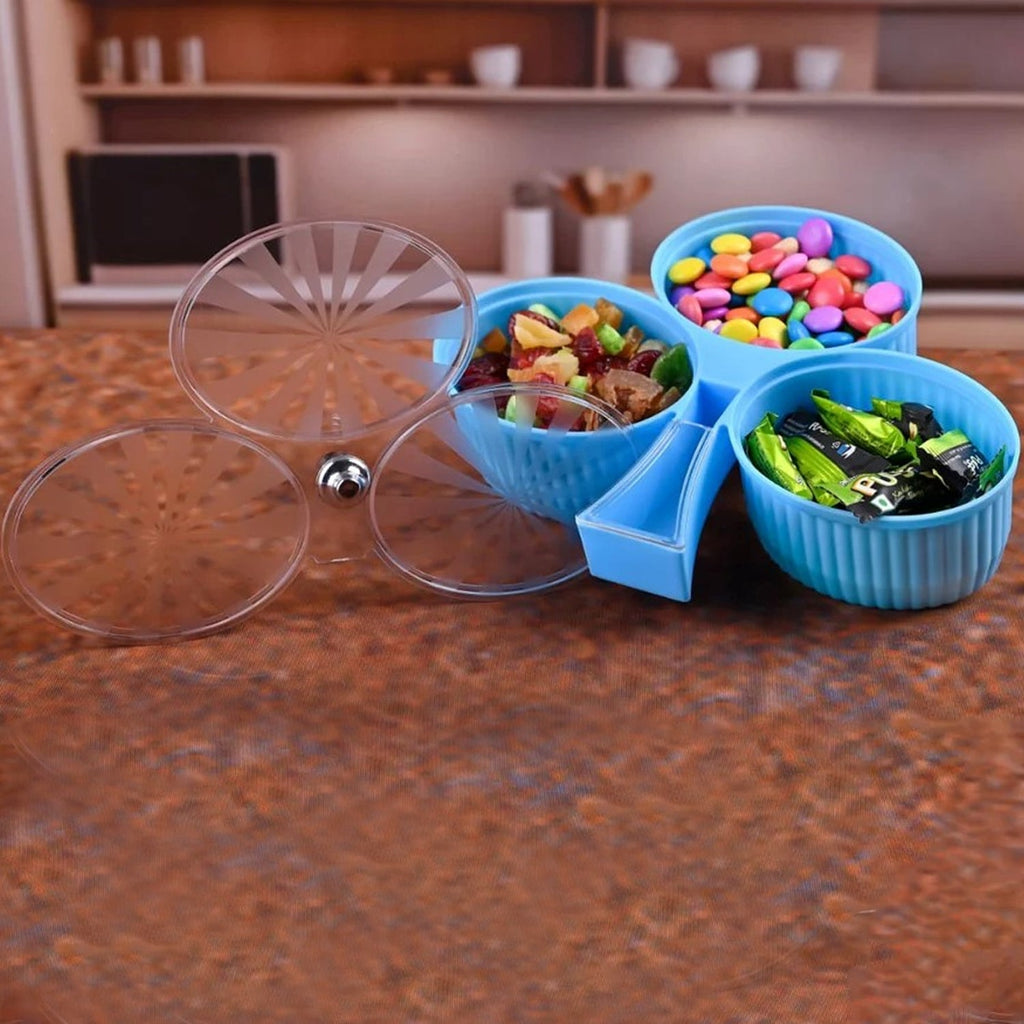 Rotating snack box with three sections for dry fruits and candies