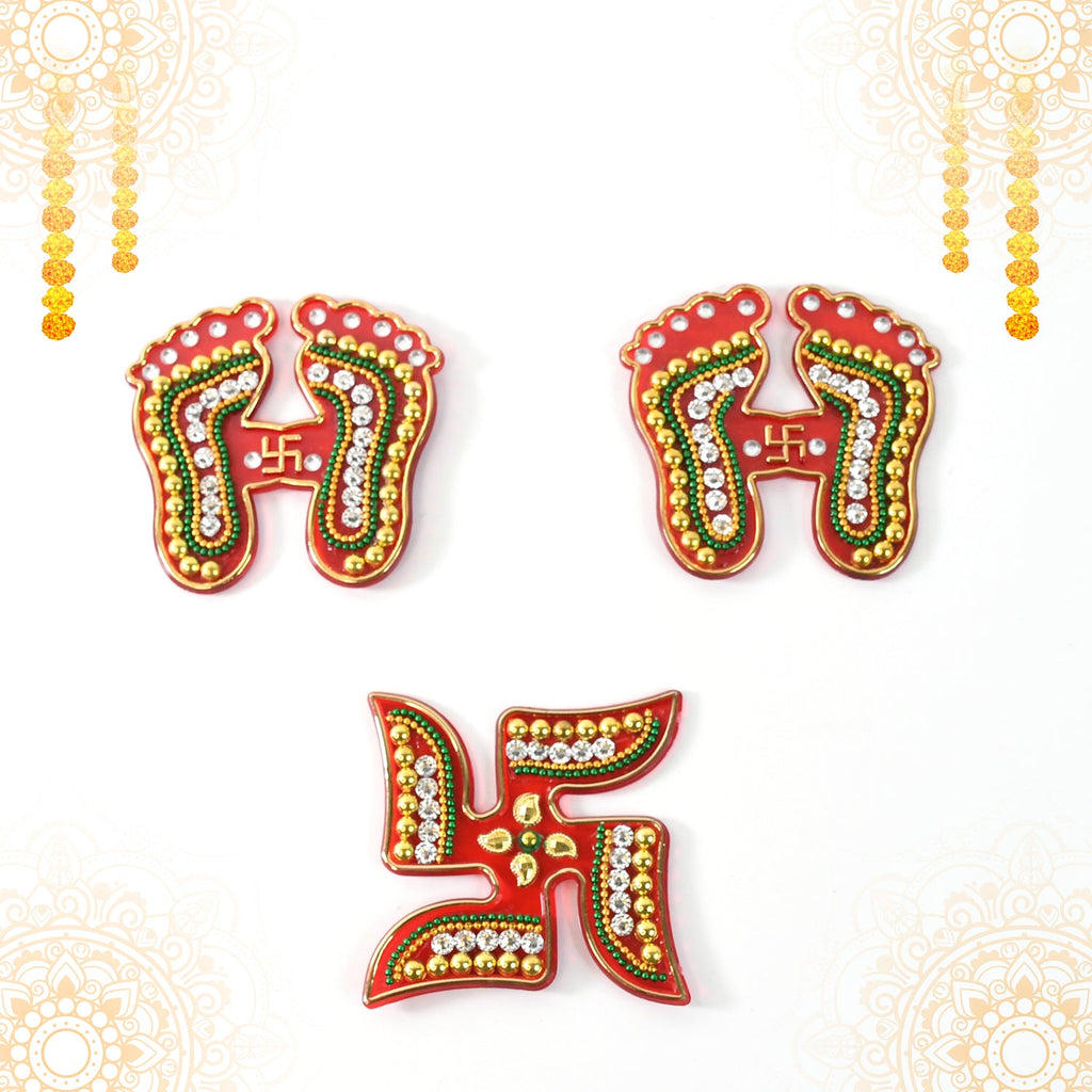 Assorted Laxmi Charan and Swastik decals in bright hues for Diwali décor