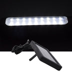 Eco shine mode lit on outdoor hanging solar LED light in garden setting