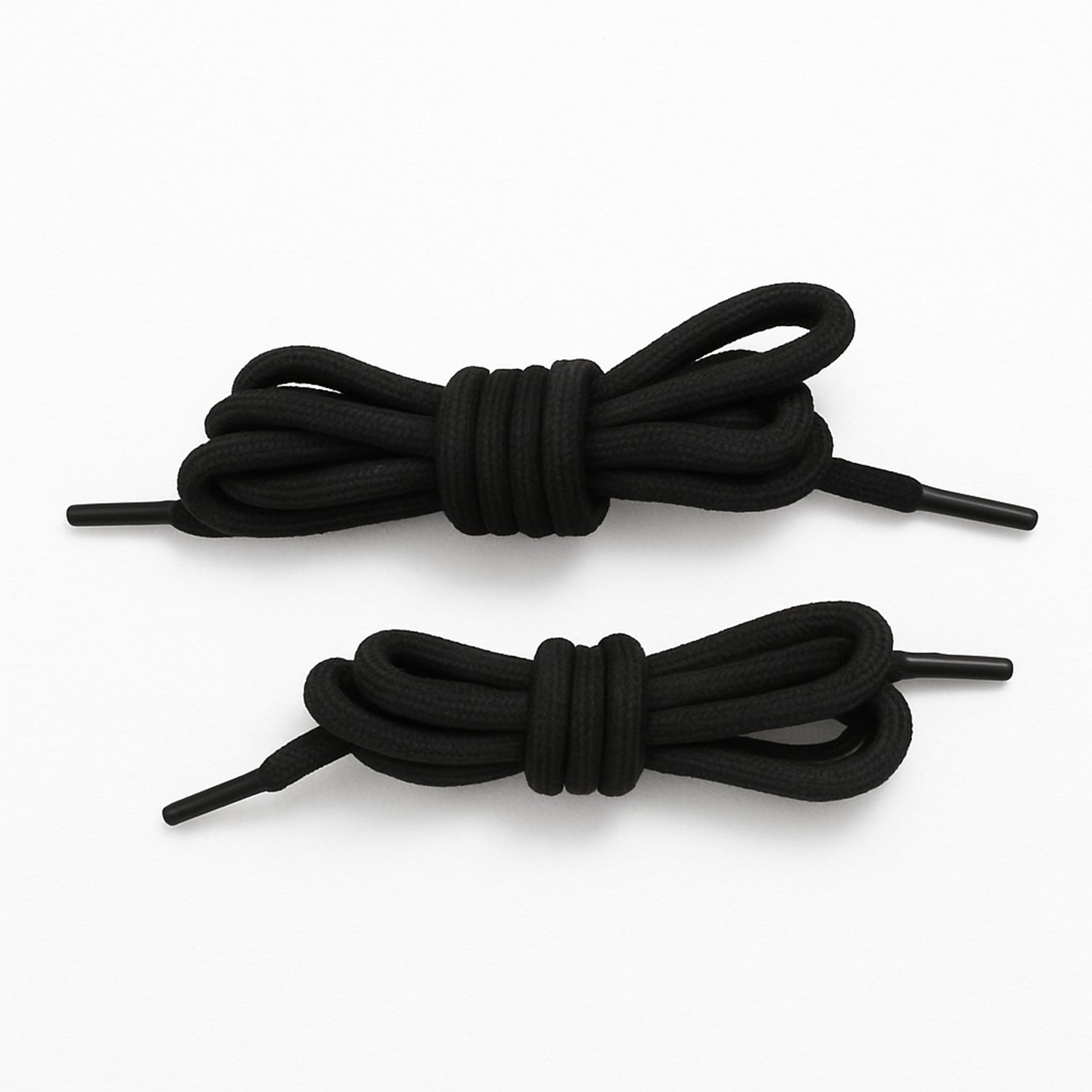 Several colourful polyester shoelaces laid out flat, highlighting the mixed color options.