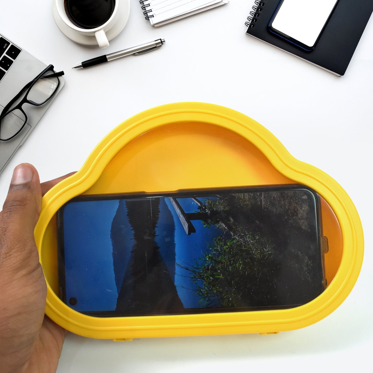 Side profile of the yellow waterproof phone holder, highlighting its slim design and secure closure.