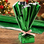 Stack of folded metallic gift wrapping paper sheets in copper gold