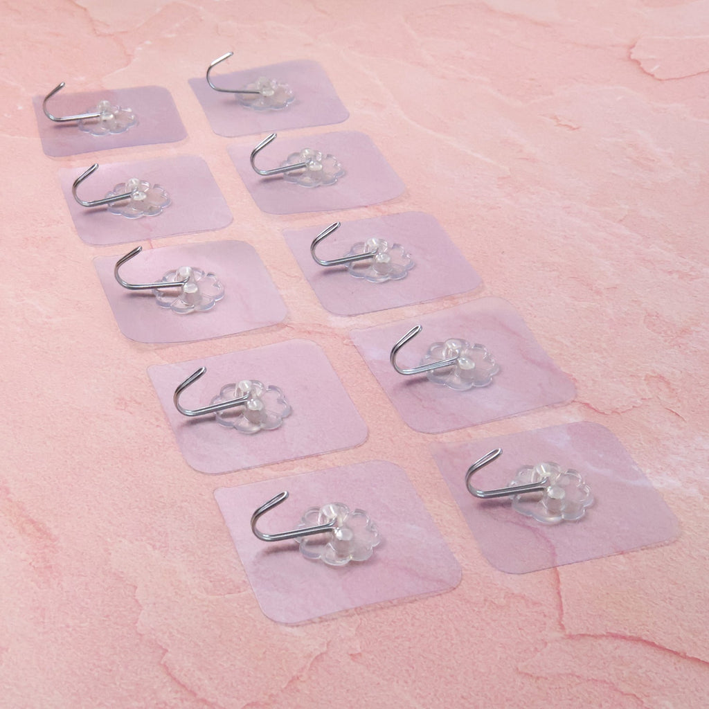 Close-up image highlighting adhesive wall hooks with transparent design