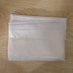 Space-efficient foldable suit cover, ideal for travel and compact storage.