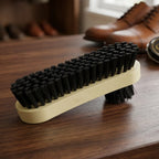 Leather shoe cleaning brush with soft bristles for gentle and effective cleaning.
