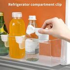 Close up of fridge storage divider showcasing adjustable plastic partition