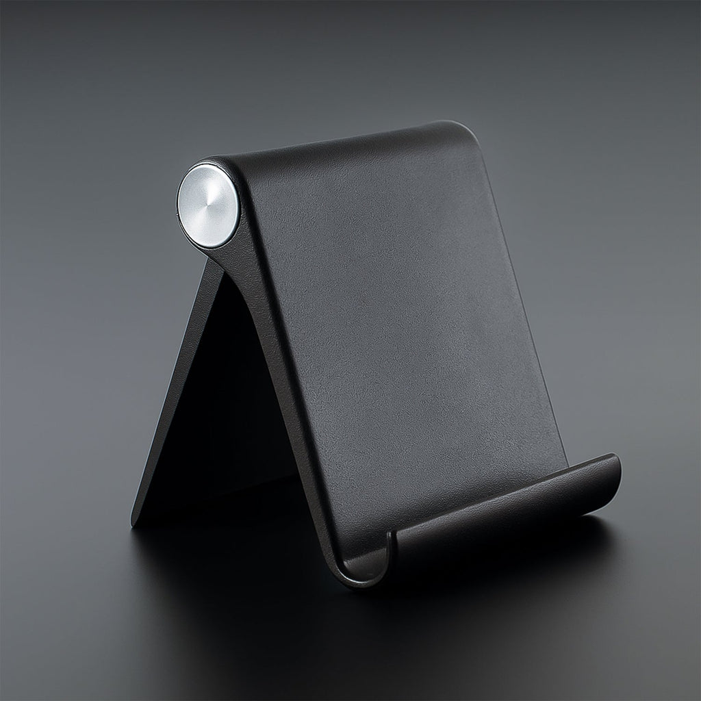 Foldable mobile stand showing adjustable angle on a study table