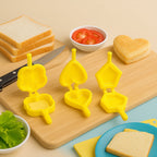 Baking essentials plastic cookie mould set featuring heart and star shapes for delightful treats.
