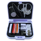 Feature close-up of sewing tools including scissors and buttons in compact sewing kit