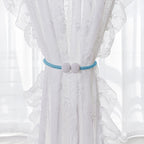 Set of two magnetic curtain tiebacks featuring pearl accents