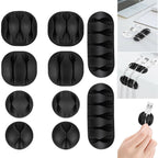 A set of 10 black cable organiser clips ready for use in home or office cable management.