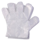 Individual disposable plastic gloves showing transparent material