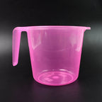 Empty transparent plastic bath mug on a plain background, ready for household use.