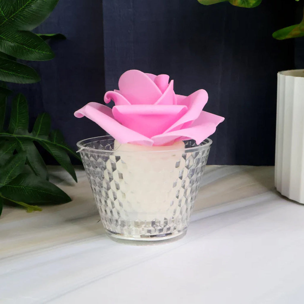 Flower-shaped flameless LED tealight candles arranged decoratively