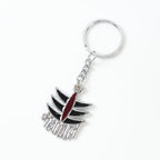 Mahakal metal keychain attached securely to a set of keys