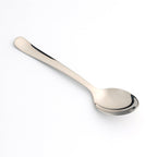 Top-down view of the elegant Stainless Steel Dining Spoon, reflecting its mirror finish.