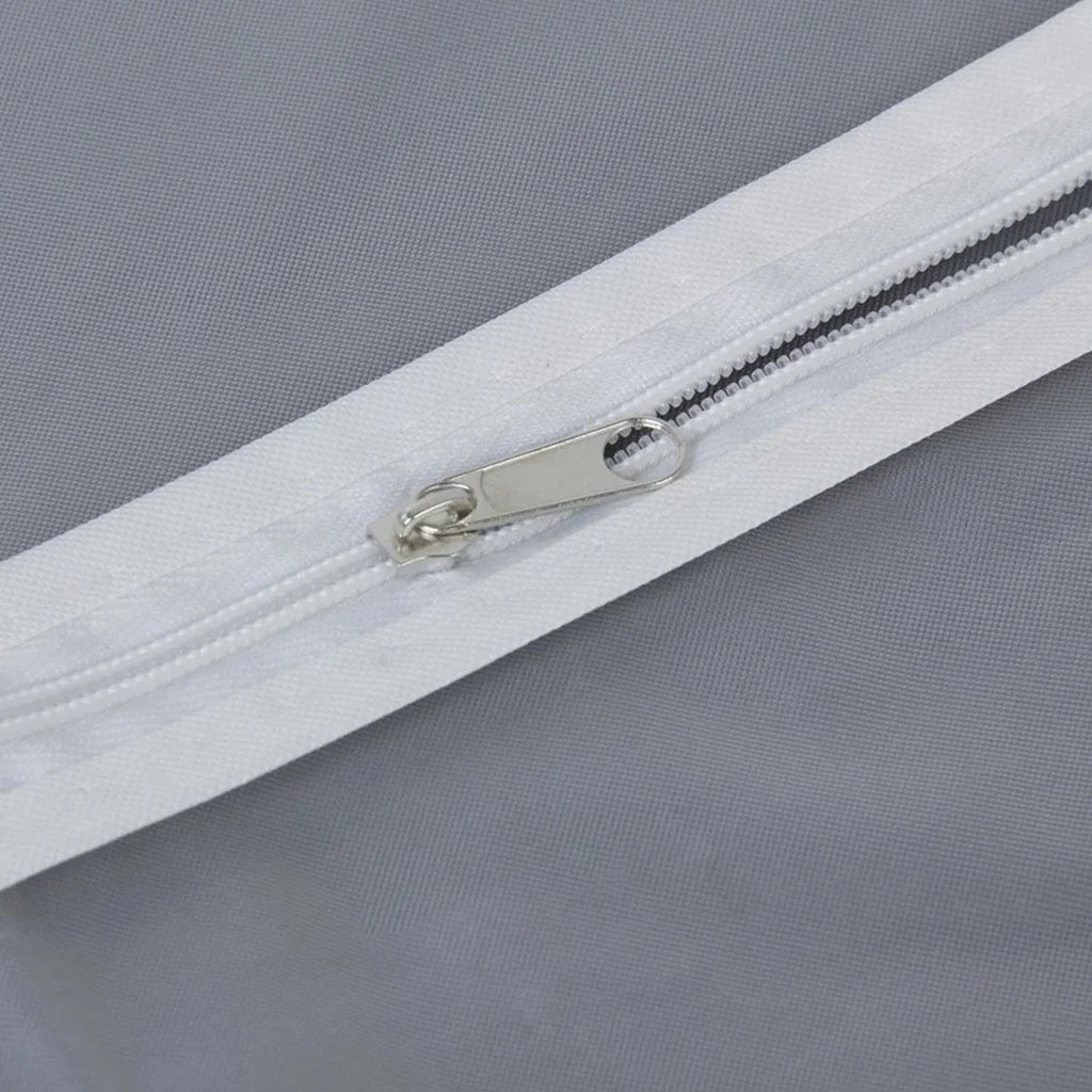 Closeup of durable full-length zipper on the breathable fabric suit cover.