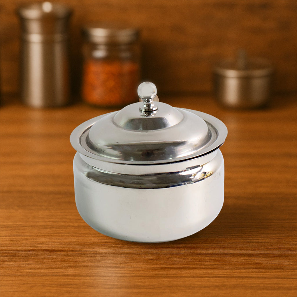 Top-down view of the Stainless Steel Ghee Pot with its lid and ladle.