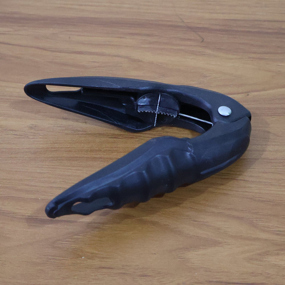 Durable handheld nut and seafood shell cracker tool