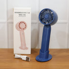 Comparison shot of rechargeable mini handheld fan size and design