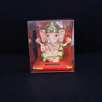 Medium Lord Ganesh Idol with softly glowing solar base amidst peaceful decor
