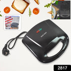 Open Dabster sandwich toaster revealing square non-stick cooking plates.
