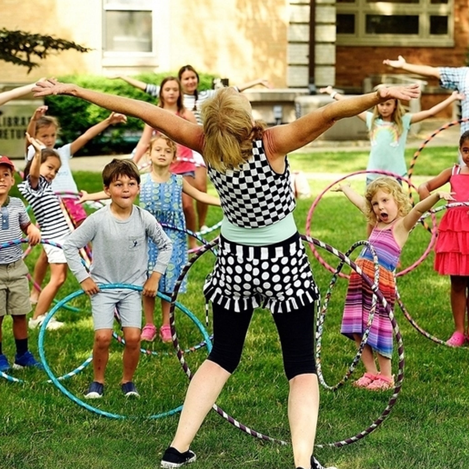 Adjustable fitness hula hoop with various size configurations.