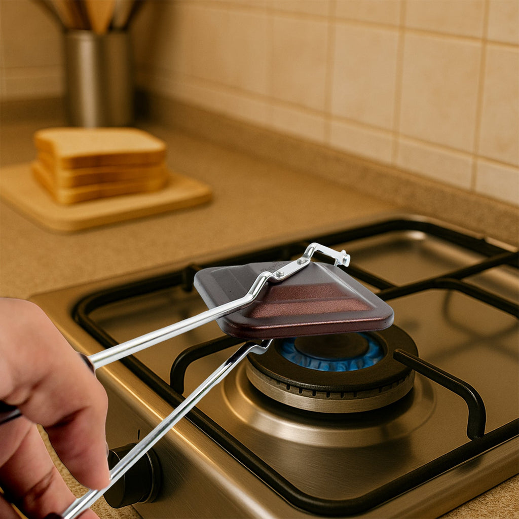 Close up of heat resistant handle on Gas Stove Sandwich Toaster for safe cooking.