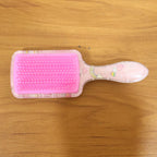 Printed kids hairbrush ideal for daily hair grooming
