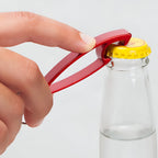 Portable bottle opener keychain suitable for travel and daily use