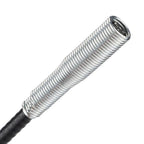 Stainless steel drain cleaning brush coiled for compact storage.