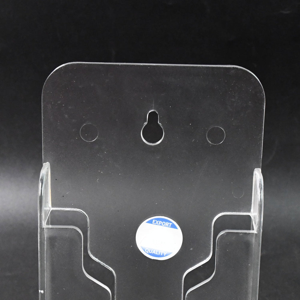 Durable ABS mobile holder securely displaying a phone on a bedroom wall.