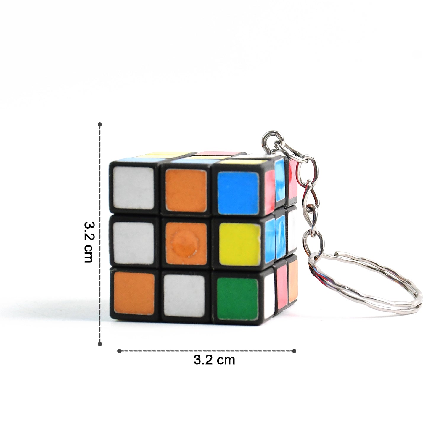 Mini Magic Cube Puzzle keychain in a travel setting, perfect for on-the-go fun.