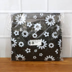 Folded LPG cylinder cover fabric showing floral print and texture