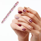 Close-up of double-sided professional nail file showing both textured surfaces