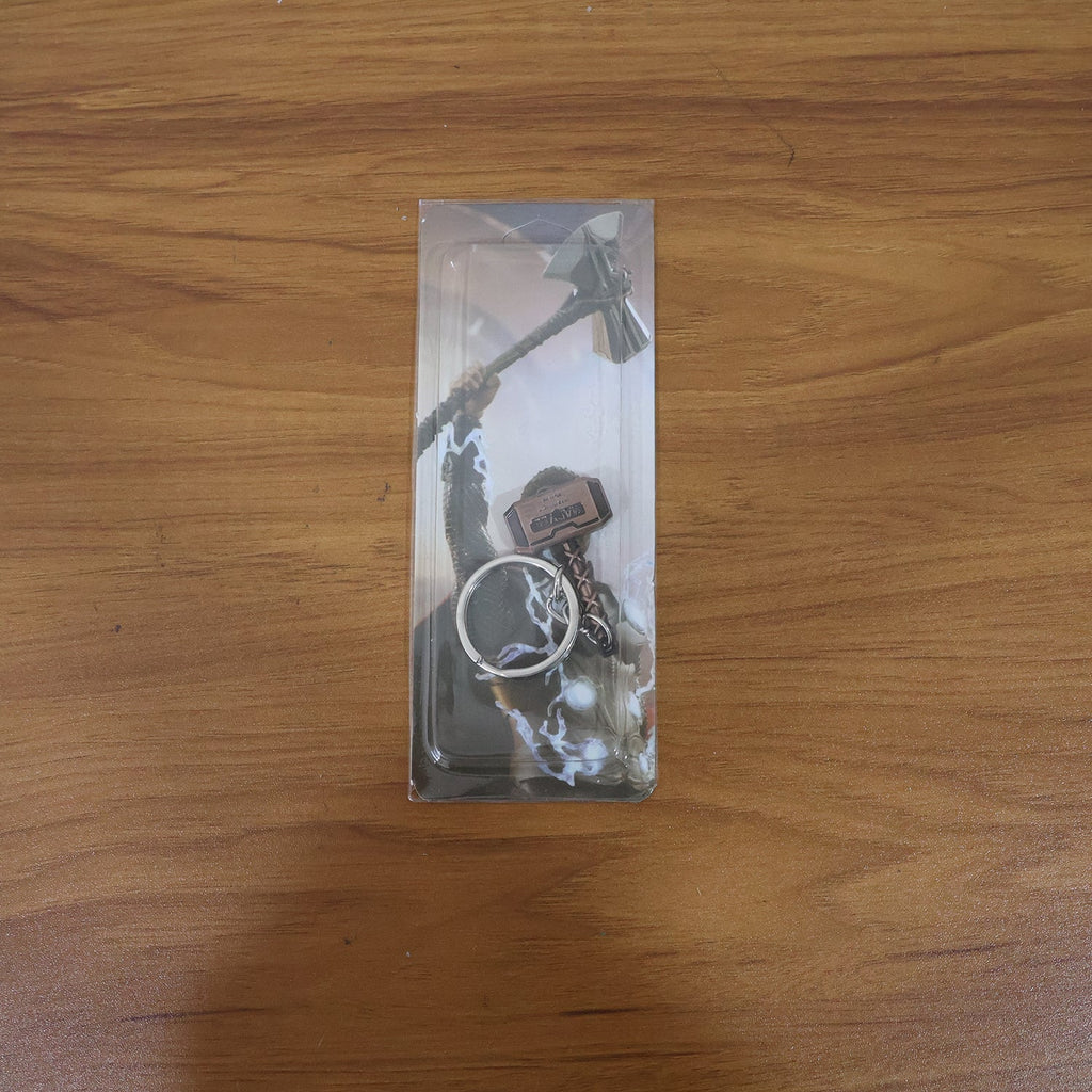 Close-up detail of metal hammer shape on keychain