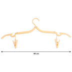 Close-up of dual clips on an adjustable folding clothes hanger