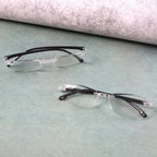 Protective case storing lightweight rimless reading glasses for travel