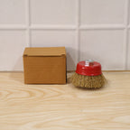 Copper-colored cup wire brush for workshop use