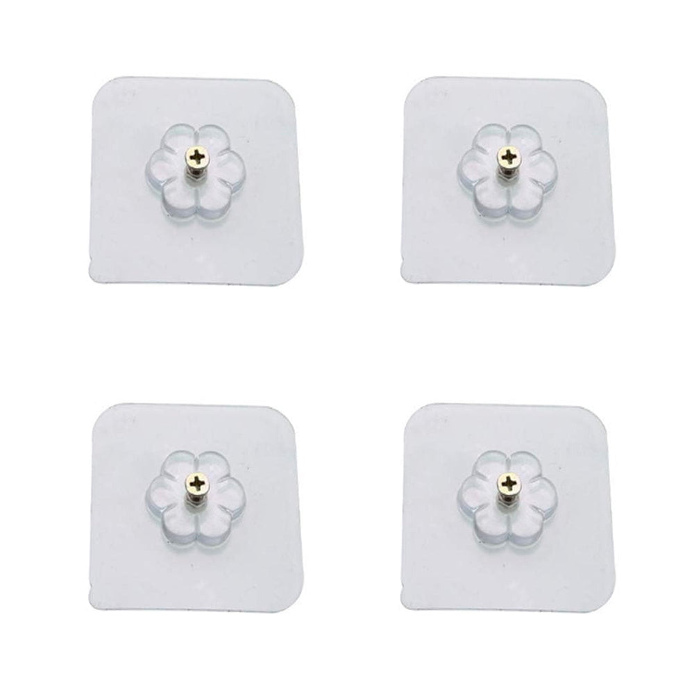 Transparent self adhesive hooks seamlessly blending into a tiled wall.