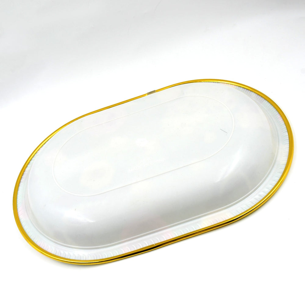 Multiple plastic serving trays stacked, highlighting their compact storage.