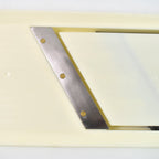 Detail of the ergonomic handle providing a comfortable grip for the user.