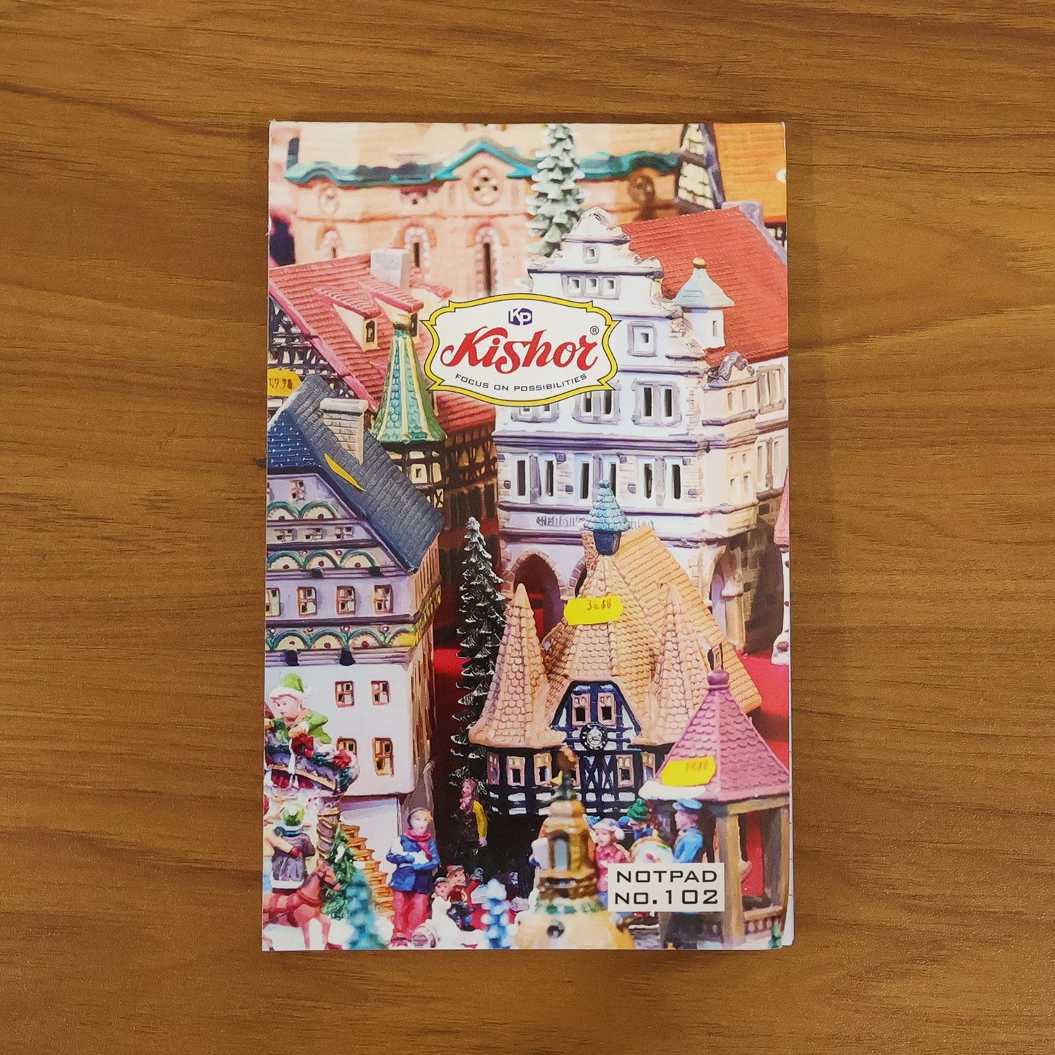 Side view of slim, compact pocket notebook with durable cover