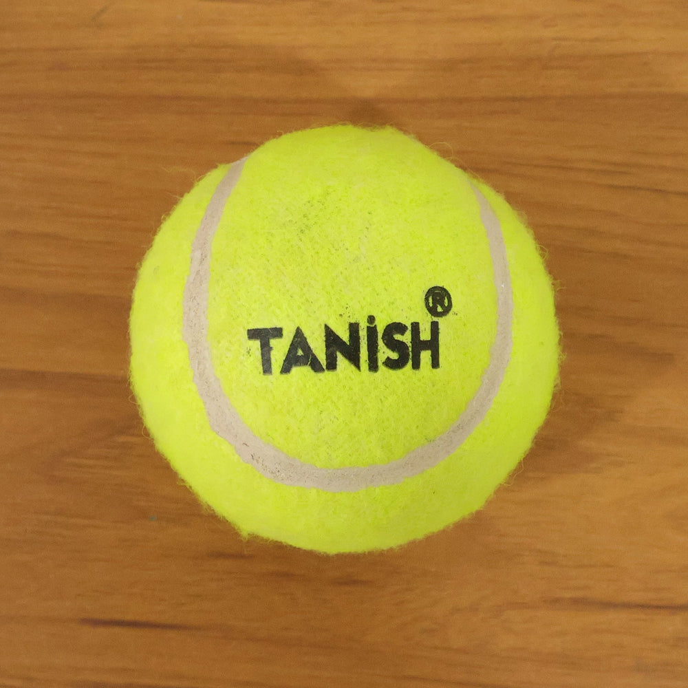 Tennis ball with bright color for easy visibility during outdoor games